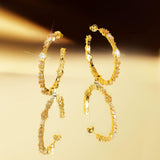 De Adriana champagne oorringen - gold plated