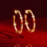 De Adriana Blush oorringen - gold plated