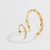 De mini Adriana champagne oorringen - gold plated