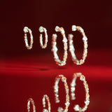 De Adriana champagne oorringen - silver plated